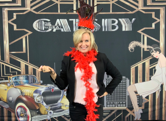 Debbie Williams showing off the Gatsby Photo Booth backdrop with Las Vegas Functions, NZ